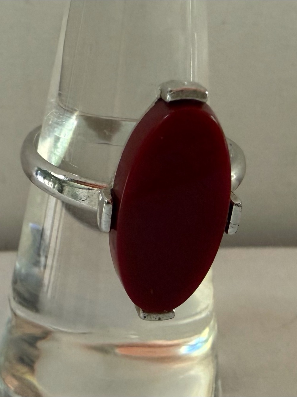 820. Sarah Coventry burgundy lucite at marquee adjustable
